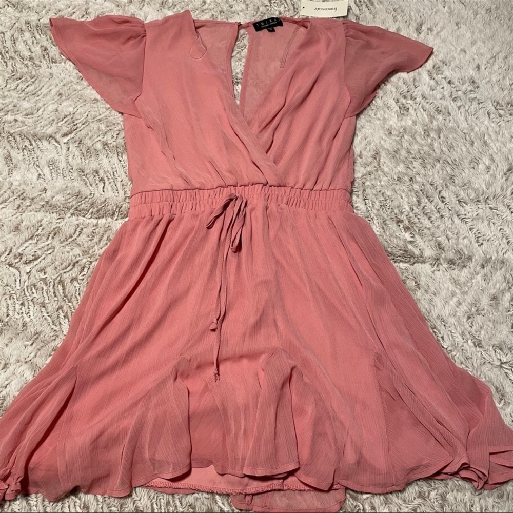Francesca’s mauve wrap dress